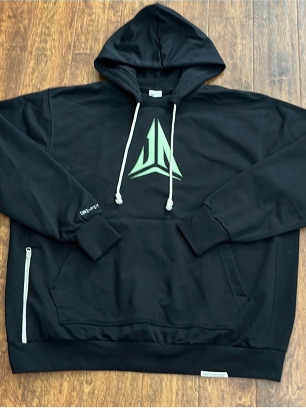 Nike Black Hoodie with Green Logo and White Drawstrings